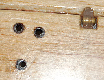 3/16" dowel hard points in the elevator to prevent the control horn from crushing the balsa.