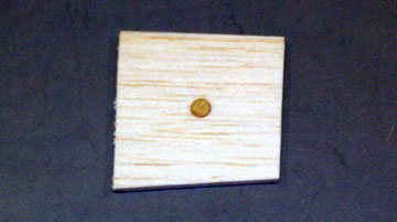The plywood circle reinforces the center of the plug.