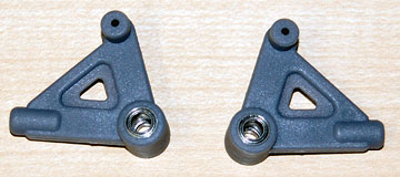 Press a bearing into each side of each aileron control lever.