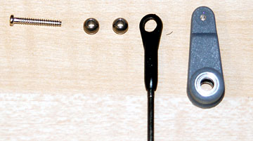 Use the M2 x 14 self-tapping screw to mount two balls to the elevator control lever.