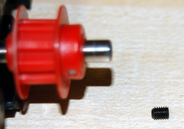 Set screw to lock pulley pin.
