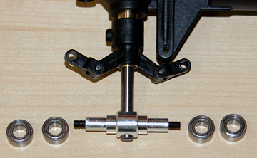 Place the tail rotor hub on the tail rotor shaft and tighten the set screws securely.