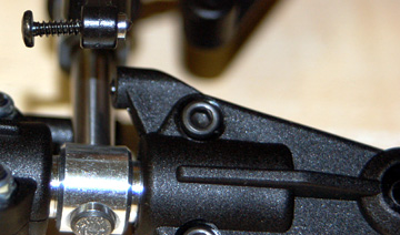 Insert a collar and self-tapping screw into each of the the tail pitch control links.