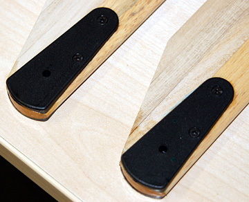 Attach the blade grips to the blades using self-tapping screws.