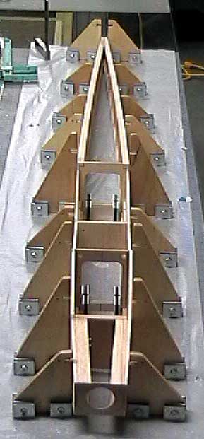 The fuselage is jigged to the building board with the formers centered and perpendicular to the centerline.