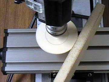 Mount the nose ring assembly in a drill or drill press and sand to shape.