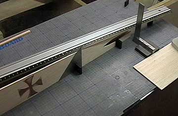 A method used to accurately locate the pushrod exits in the fuselage.