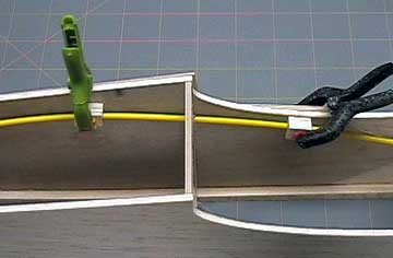 Locate the blocks so that the throttle cable has large bends when bends are necessary to prevent binding.