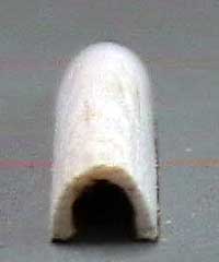 The walls of the fairing can be as thin as you feel comfortable making them. They do not contribute any structural strength to the airframe and only need to support themselves.