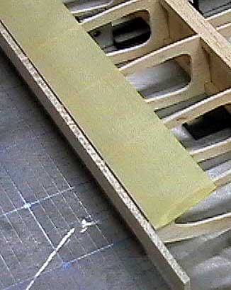 Use masking tape to protect ribs while sanding sub-leading edge.