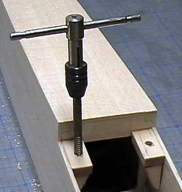 Tap the blocks for the wing bolts.  It is a good idea to oil-proof the holes with thin CA.