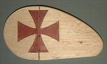A fin and rudder that has been fiberglassed.