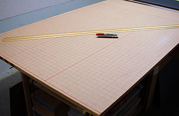 Draw a grid on the board(s).