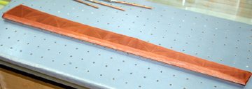 One side of the aileron is silked.