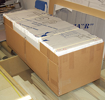 Wrap the crate in a cardboard shell to prevent it from chipping apart during shipment.