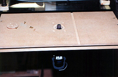 An inset allows a small hole for small bits and small work.  Removing it allows larger bits to be used.