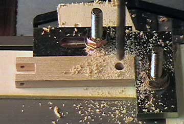 Drill the presses for the thumb screw presses.