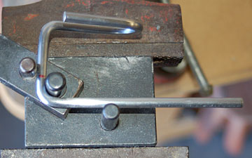 A second 90 bend completes the wire bending process.