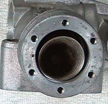 The piston is inserted through the top of the engine