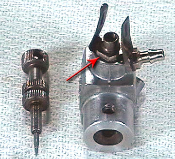 High-speed needle ratchet is retained by a nut that also retains the spray bar