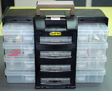 Multi-Compartment bait box for storing airbrushes.