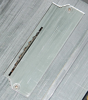 Optional carbide-tipped blade with home-made aluminum zero-clearance blade plate.