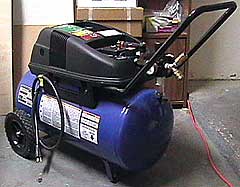 An air compressor has many uses in a shop.