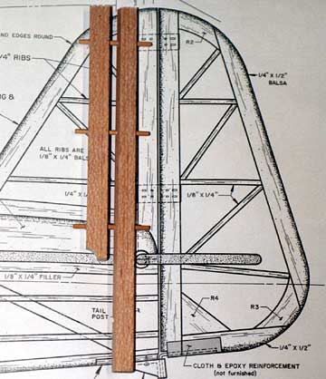 It is possible to do all the hinging before building.  Then use hinge blanks (dowels for hinge points or 1/32" plywood for flat hinges) to keep the parts aligned during assembly.