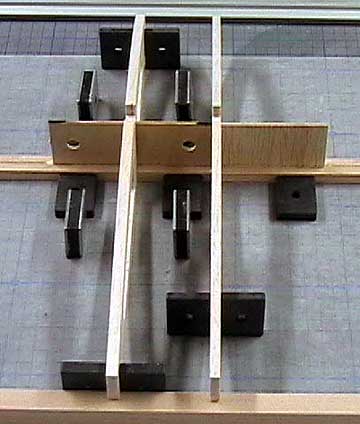 Magnets can be used to hold ribs square to the board.