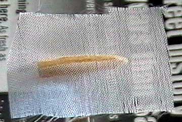 Put the glass cloth over the part and work it in place using a blotting motion.