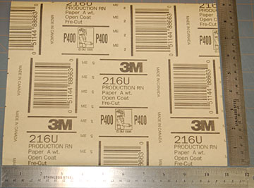 A standard sheet of sandpaper is 9" x 11".